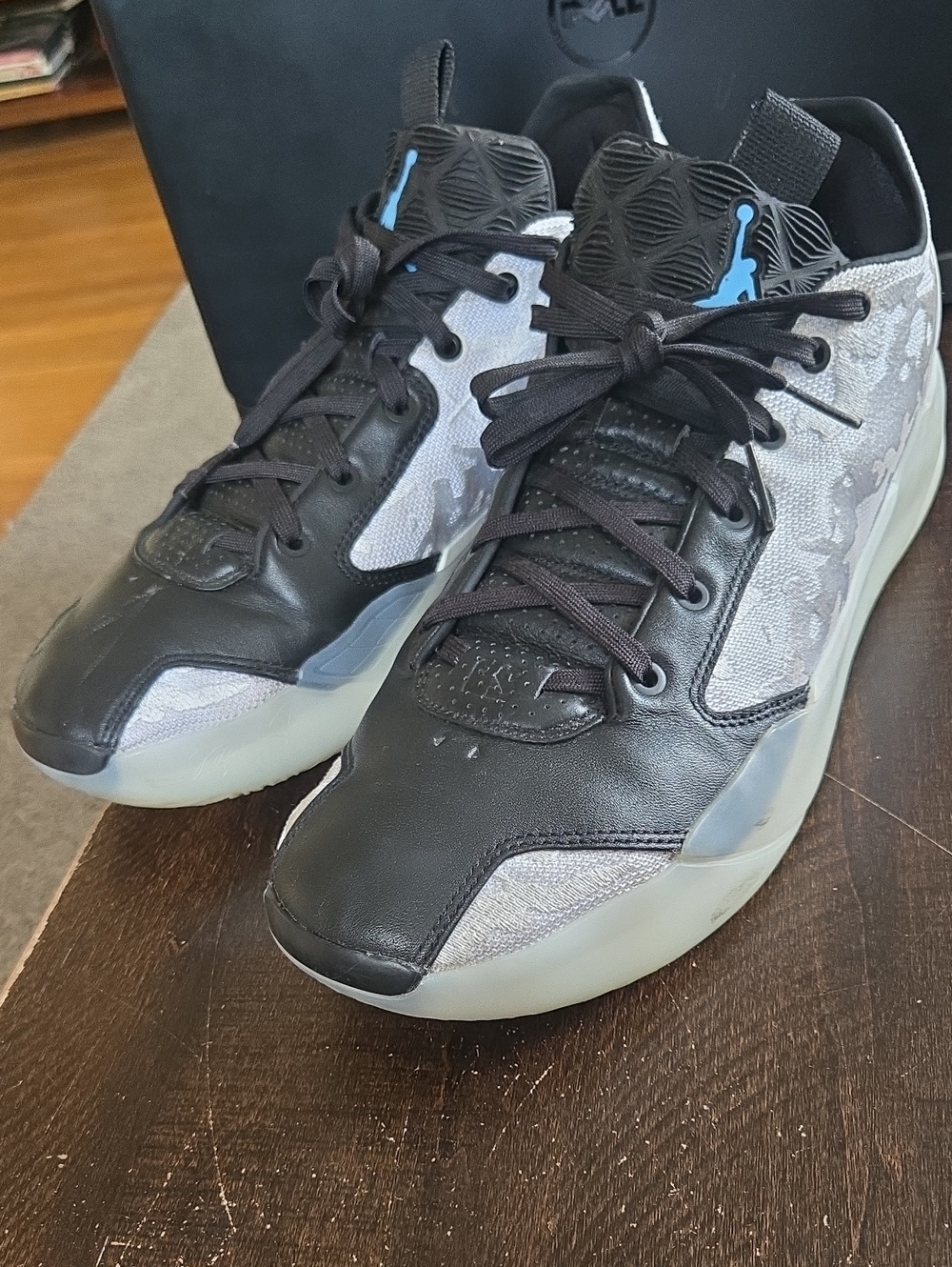Jordan Mid/Low Black and Grey Athletic Sneakers with Blue Jumpman